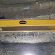A top-running, double girder overhead bridge crane installed in an underground U.S. Gypsum Company Shoals Mine in Indiana