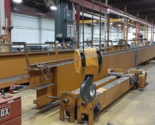 Overhead crane rehabbed by CraneWerks for Service Crane Company's steel processing customer