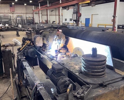 Overhead crane rehabbed by CraneWerks for Service Crane Company's steel processing customer