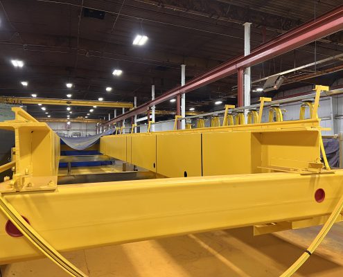 Overhead crane rehabbed by CraneWerks for Service Crane Company's steel processing customer