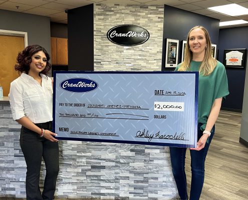 Solnahomi "Sol" Jimenez-Mendoza being awarded the $2,000 2024 Roger Graham Scholarship by Ashley Larochelle of CraneWerks, Inc. in Morristown, IN