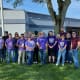 Lucky Singh, Darren Atkinson, Misty Sprague, Kaileigh Moore, Jon Thomas, Ashley Larochelle, Bernadette Thomas, Jeff Pummill, Mary Apple, Charline Thomas, Mark Thomas, Joey Shepherd, Shelly Uhlmansiek, Matt Riddle, Jordan Smith, Susan Allen, and Conner Davis of CraneWerks in Morristown, IN supporting The Longest Day of the Year with Lucys for Lynn in honor of Lynn Thomas for Alzheimer's awareness.